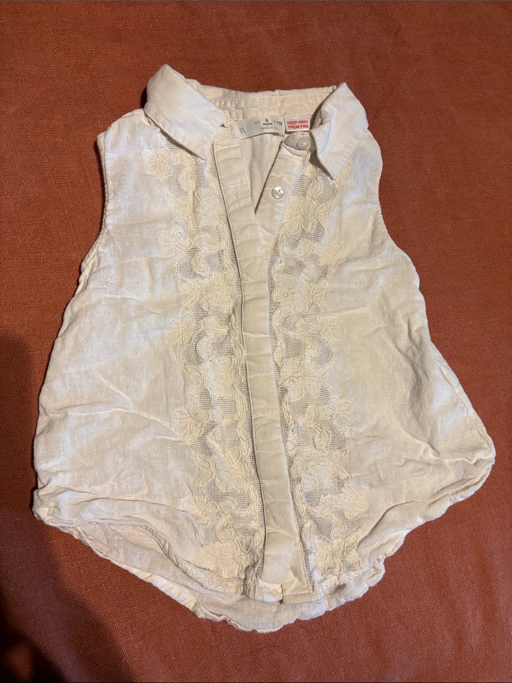 Sleeveless Embroidered Button-Front Top